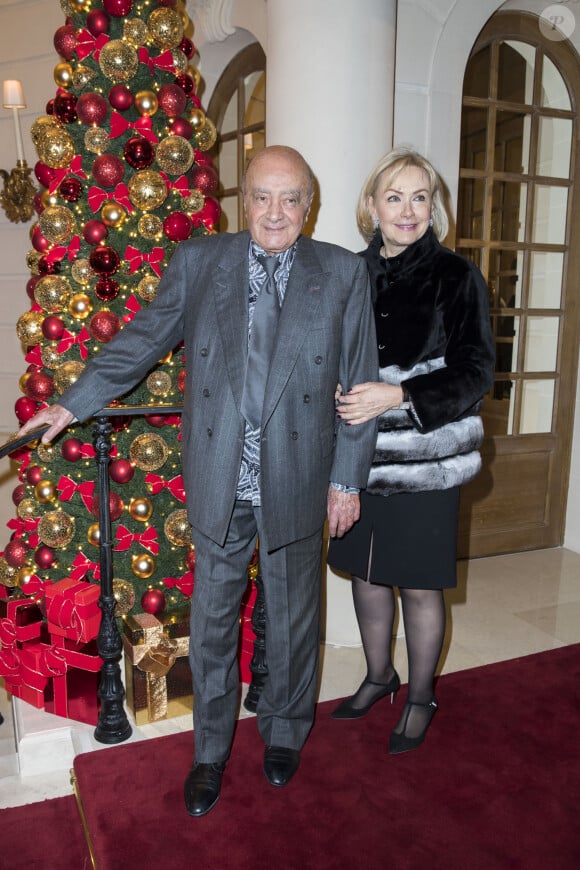 Mohamed Al-Fayed et sa femme Heini Wathén - Photocall lors du deuxième défilé Chanel "Métiers d'Art" au Ritz à Paris, France, le 6 décembre 2016. Cette collection destinée à mettre en valeur le précieux savoir-faire des ateliers Chanel (bottier, plisseur, plumassier, brodeur, ...) donne lieu depuis 2002 à un défilé au mois de décembre. Karl Lagerfeld choisit chaque année un lieu lié à l'histoire de mademoiselle Chanel. Gabrielle Chanel (Coco) a loué à partir de 1937 une suite au troisième étage du Ritz. © Olivier Borde/Bestimage 