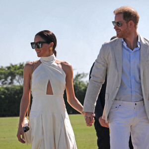 Photo datée du 12/04/24 du Duc et de la Duchesse de Sussex lors du Royal Salute Polo Challenge, au profit de Sentebale, au USPA National Polo Center à Wellington, Floride, Etats-Unis.