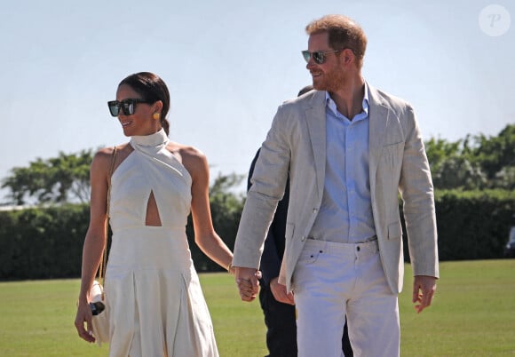 Photo datée du 12/04/24 du Duc et de la Duchesse de Sussex lors du Royal Salute Polo Challenge, au profit de Sentebale, au USPA National Polo Center à Wellington, Floride, Etats-Unis.