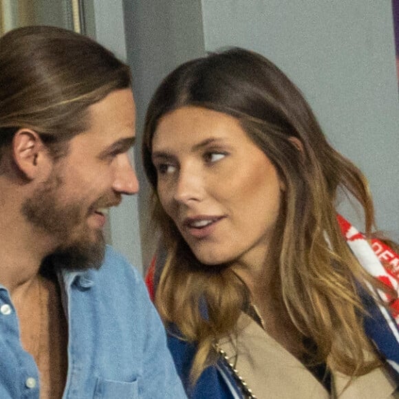 Camille Cerf (Miss France 2015) et son compagnon Théo Fleury - People dans les tribunes lors du match de la 5ème et avant-dernière journée de Ligue des nations entre la France et l'Autriche (2-0) au Stade de France à Saint-Denis le 22 septembre 2022.