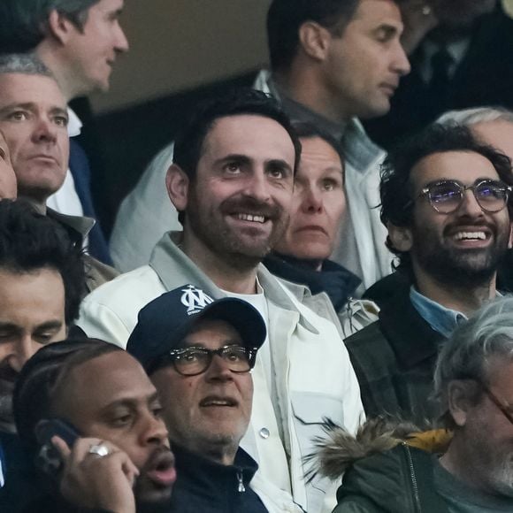 Jean-Roch, Camille Combal, Matthieu Madenian, Patrick Bosso - Célébrités dans les tribunes de la demi-finale de Ligue Europa entre l'Olympique de Marseille et Atalanta Bergame (1-1) à Marseille le 2 mai 2024.