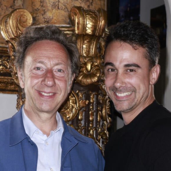 Stéphane Bern et son compagnon Yori Bailleres - Célébrités au défilé de mode Haute-Couture automne-hiver 2024/2025 “Julien Fournié” lors de la Fashion Week au musée Grévin à Paris le 25 juin 2024.