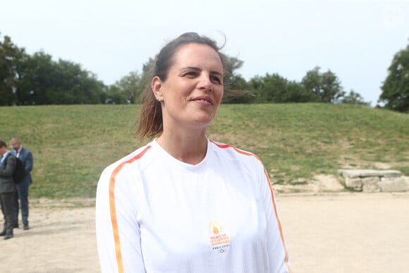 Laure Manaudou lors de la cérémonie d'allumage de la flamme olympique pour les Jeux olympiques de Paris 2024 sur le site archéologique de l'ancienne Olympie, berceau des Jeux olympiques antiques dans le sud de la Grèce, le 16 avril 2024. Photo par Eurokinissi/ABACAPRESS.COM