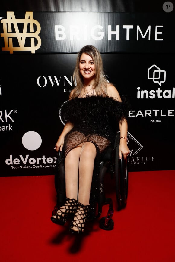 Exclusif - Nadjet (Miss Wheelchair world) - Photocall de la soirée de Magali Berdah au théâtre Mogador à Paris le 8 octobre 2024. © Marc Ausset-Lacroix/Christophe Clovis/Bestimage