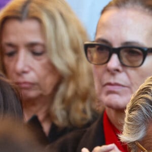 Carole Bouquet, Christian Clavier, saisi par l'émotion - Sortie des Obsèques de Michel Blanc en l'église Saint-Eustache à Paris, le 10 octobre 2024. © Moreau / Jacovides / Bestimage 