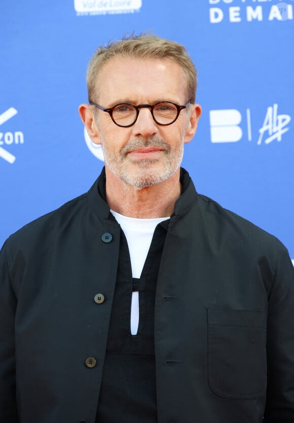 L'acteur témoigne de son pessimisme vis-à-vis du futur, un sentiment qui pourrait expliquer en partie sa réticence à envisager la paternité...
Lambert Wilson - Festival du film de Demain au Ciné Lumière à Vierzon le 30 Mai 2024. Coadic Guirec/Bestimage