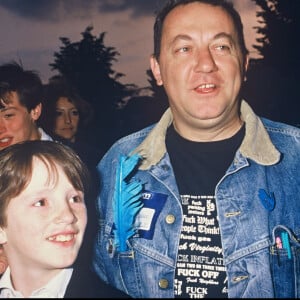 Coluche et son fils Romain.