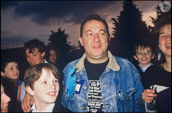 Coluche et son fils Romain.