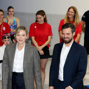 Exclusif - La princesse Charlene de Monaco et Pierre Klaveren, le président de Special Olympics Monaco - La princesse Charlene de Monaco a présidé la cérémonie d'ouverture du meeting européen de natation " Princesse Charlène " organisé par Special Olympics Monaco au Centre Nautique Albert II à Monaco. Le 26 octobre 2024 © Claudia Albuquerque / Bestimage 