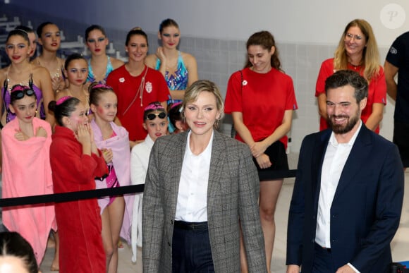 Exclusif - La princesse Charlene de Monaco et Pierre Klaveren, le président de Special Olympics Monaco - La princesse Charlene de Monaco a présidé la cérémonie d'ouverture du meeting européen de natation " Princesse Charlène " organisé par Special Olympics Monaco au Centre Nautique Albert II à Monaco. Le 26 octobre 2024 © Claudia Albuquerque / Bestimage 