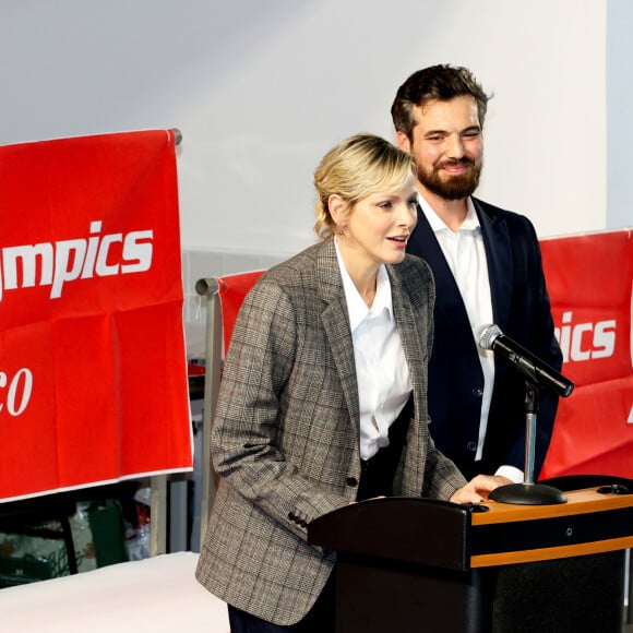 Exclusif - La princesse Charlene de Monaco et Pierre Klaveren, le président de Special Olympics Monaco - La princesse Charlene de Monaco a présidé la cérémonie d'ouverture du meeting européen de natation " Princesse Charlène " organisé par Special Olympics Monaco au Centre Nautique Albert II à Monaco. Le 26 octobre 2024. © Claudia Albuquerque / Bestimage 