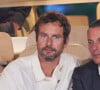 François Roelants et son mari Marc-Olivier Fogiel - Personnalités dans les tribunes lors des Internationaux de France de tennis de Roland Garros 2024 à Paris. Le 29 mai 2024 © Jacovides-Moreau / Bestimage