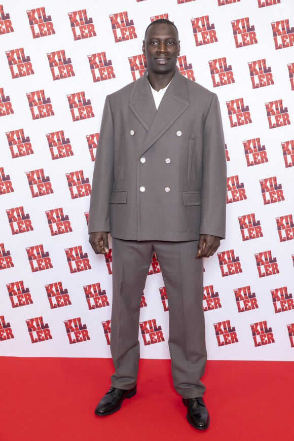 "Ça n'a l'air de rien mais quand t'es noir et que tu vis en france, c'est toujours bien d'avoir tes papiers sur toi." 
Omar Sy - Avant première Parisienne " The Killer " au Pathé Palace à Paris le 21 octobre 2024. © Olivier Borde / Guirec Coadic / Bestimage 