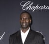 Les contrôles d'identité comme il l'a fait savoir dans le podcast Flashback de Brut
Omar Sy - Photocall du dîner "Trophée Chopard" au Carlton Beach lors du 77ème Festival International du Film de Cannes. Le 17 mai 2024 © Olivier Borde / Bestimage