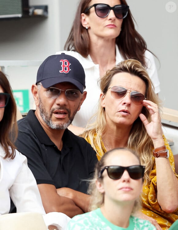 Roschdy Zem et Sarah Lavoine en tribunes des Internationaux de France de tennis de Roland Garros 2023 à Paris le 11 juin 2023. © Jacovides-Moreau/Bestimage