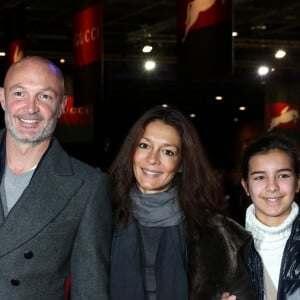 Frank Leboeuf avec sa compagne Chrislaure Nollet (ex-femme de Fabrice Santoro) et la fille de celle-ci Djenae - Gucci Paris Masters 2013 a Villepinte le 8 decembre 2013.