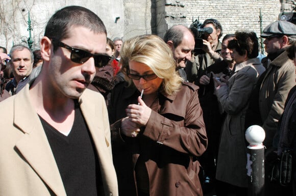 Catherine Deneuve, Melvil Poupaud et Pierre Lescure à la cérémonie d'adieu à Alain Bashung, à Paris, le 20 mars 2009.