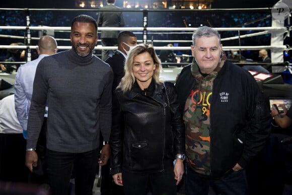 Plus du tout ami avec Laure Boulleau et Hervé Mathoux, Pierre Ménès l'a clairement fait savoir. 
 
Habib Beye, Laure Boulleau et Pierre Ménès - People lors de la soirée de boxe à Paris La Défense Arena le 25 septembre 2020. © JB Autissier / Panoramic / Bestimage