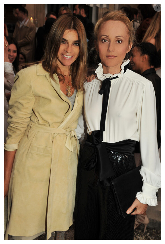 Carine Roitfeld et Hannah McGibbon, directrice artistique de Chloé, lors de la soirée organisée pour le lancement du parfum Love, Chloé. Le 16 juin chez Apicius. Paris