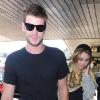 Miley Cyrus prend l'avion à l'aéroport LaGuardia à New York, en compagnie de son chéri Liam Hemsworth, vendredi 18 juin.