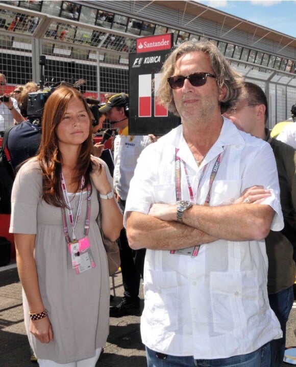 Eric Clapton et Melia au Grand Prix de Silverstone, le 11 juillet 2010.