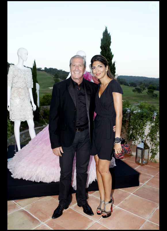 Jean-Claude Darmon et Hoda Roche à la Dior Party, au Country Club de Saint-Tropez, le 15/07/2010.