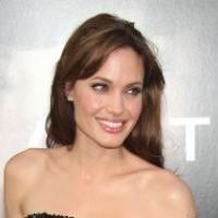 Quand Angelina Jolie débarque avec ses quatre bambins, c'est un défilé stylé et rempli de bonheur !