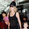 Heidi Klum et ses enfants à l'aéroport juste avant qu'elle ne débarque en France.