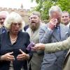 Clarence House, le 10 septembre 2010 : le prince Charles et Camilla Parker Bowles piquent un fou rire mémorable devant les 16 chats d'un orgue très spécial !