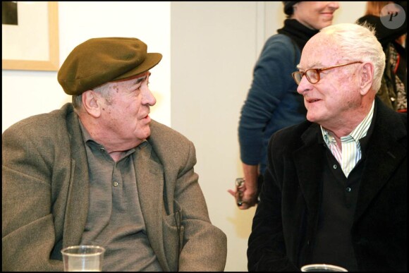 James Ivory et Bernardo Bertolucci à l'occasion de l'inauguration de l'exposition de photographies de ce dernier, à New York, le 16 décembre 2010.