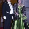 La reine Margrethe de Danemark donnait le 1er janvier 2011 le traditionnel dîner de gala du Nouvel An au palais Christian VII, à Stockholm. Dans une robe verte qu'on l'a déjà vue porter...