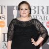 Adele lors des Brits Awards le 15 février 2011 à Londres dans une superbe robe 