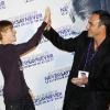 Nikos est aux côtés de Justin Bieber à la première de son film Never Say Never, présenté au Grand Rex, à Paris, le 17 février 2011.