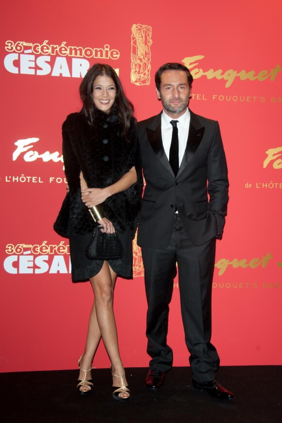 Mélanie Doutey et Gilles Lellouche arrivent au gala organisé au restaurant le Fouquet's à Paris, le 25 février 2011.