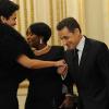 Nicolas Sarkozy salue Farida Khelfa lors du dîner avec l'invité d'honneur le président d'Afrique du sud, à l'Elysée le 2 mars 2011 à Paris