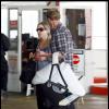Christina Applegate et son fiancé Martyn LeNoble se promènent avec leur fille Sadie dans les rues de Los Angeles, en mars 2011