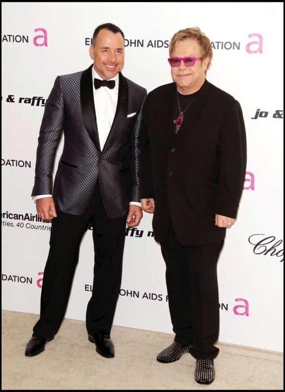 Elton John et son époux David Furnish en février 2011.