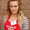 Hilary Duff participe au Mission Easter for the Homeless, afin de servir des repas chauds aux sans-abri, vendredi 22 avril à Los Angeles.