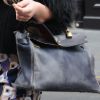 Contrairement à sa soeur, Ashley Olsen a choisi un sac vintage... Moins classe ! Paris, 23 avril 2011