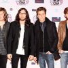 Matthew, Nathan, Jared et Caleb Followill du groupe Kings of Leon posent lors des MTV Europe Music Awards en novembre 2010 à Madrid