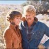 Jane Fonda et Robert Redford sur le tournage du film Le Cavalier Electrique en 1979. La belle brune est alors un véritable sex-symbol.
 