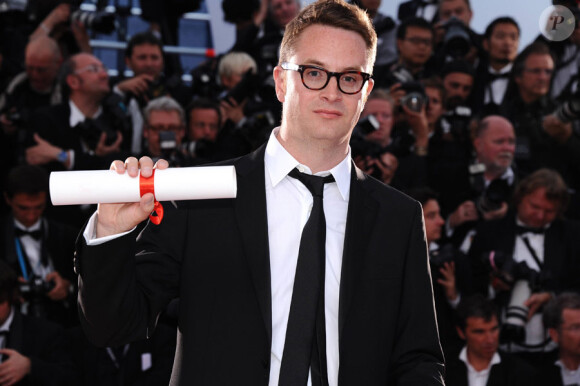Nicolas Winding Refn, prix de la mise en scène pour Drive, lors de la séance photo post-palmarès du festival de Cannes le 22 mai 2011