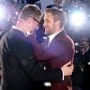Nicolas Winding Refn, prix de la mise en scène pour Drive, avec son acteur Ryan Gosling, lors de la séance photo post-palmarès du festival de Cannes le 22 mai 2011