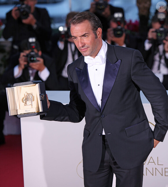 Jean Dujardin lors de la séance photo post-palmarès du festival de Cannes le 22 mai 2011