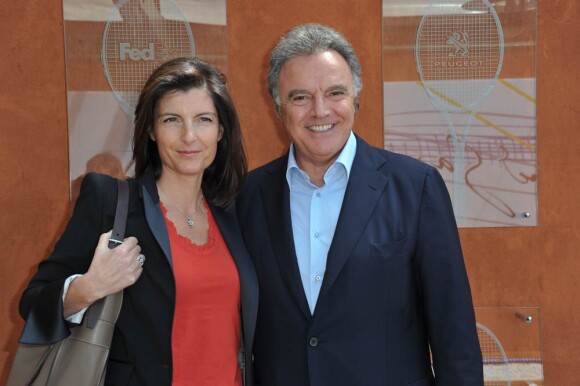 Alain Afflelou et sa femme à Roland-Garros, à Paris, le 27 mai 2011.