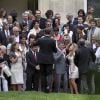 Jean-Marie Bigard et sa femme Lola Marois entourés de leurs familles et amis, lors de leur mariage à la mairie du VIIe arrondissement de Paris, le 27 mai 2011.