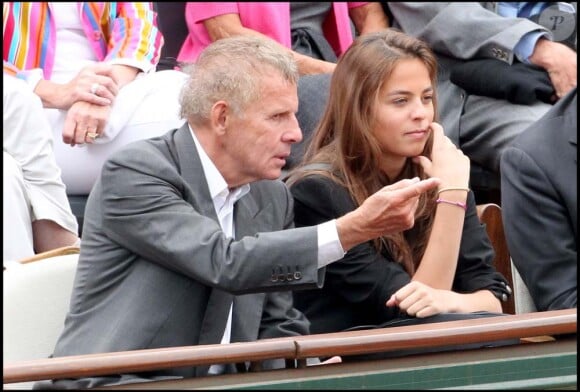 Patrick Poivre d'Arvor et Anouchka Delon, à Roland-Garros, Paris, le 31 mai 2011.