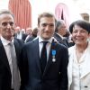 Renaud Capuçon reçoit la Legion d'Honneur en compagnie de son épouse Laurence Ferrari à l'Elysée le 15 juin 2011 à Paris