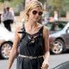 Après le sport, Heidi Klum s'est métamorphosée en ravissante vestale avec sa longue robe noire et fluide. Magnifique ! New York, 6 juillet 2011