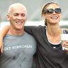 Heidi Klum s'offre une séance de sport dans la joie et la bonne humeur avec son coach préféré ! New York, 6 juillet 2011